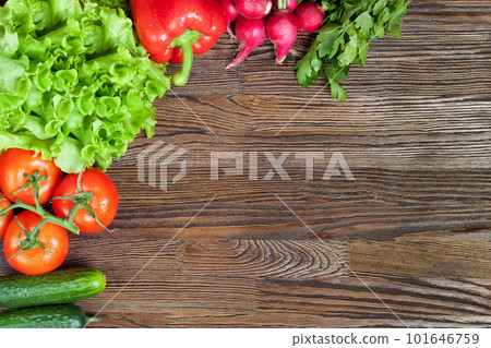 Vegetables on wooden background 101646759