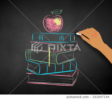 Hand drawing apple on books on chalkboard background 101647144