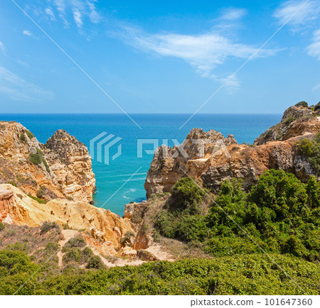 Atlantic rocky coast (Lagos, Algarve, Portugal). 101647360