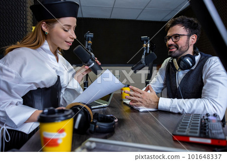 Young girl talking with dark-haired man 101648337