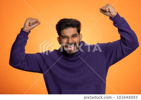 Happy indian man celebrating success, winning, birthday, lottery jackpot goal achievemen, good news 101648893