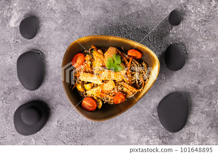 Udon stir-fry noodles with salmon and vegetables. Asian cuisine 101648895