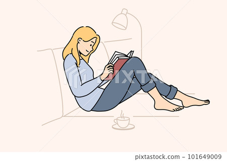 Woman relax on sofa reading book Woman relax on sofa reading book 101649009