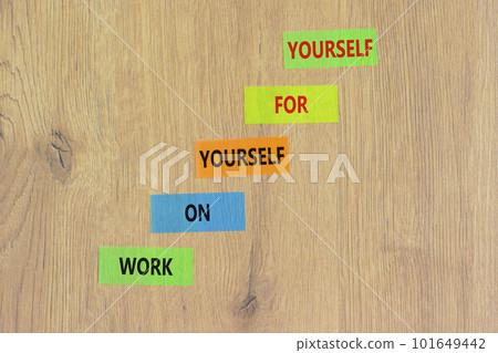 Work for yourself symbol. Concept words Work on yourself for yourself on colored paper. Beautiful wooden table wooden background. Business and work for yourself concept. Copy space. 101649442