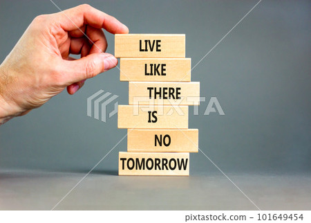 Live like no tomorrow symbol. Concept words Live like there is no tomorrow on wooden blocks. Beautiful grey table grey background. Businessman hand. Business Live like no tomorrow concept. Copy space. Live like no tomorrow symbol. Concept words Live like there is no tomorrow on wooden blocks. Beautiful grey table grey background. Businessman hand. Business Live like no tomorrow concept. Copy space. 101649454