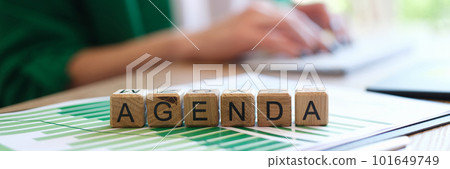 Agenda word made with wooden cubes in row 101649749