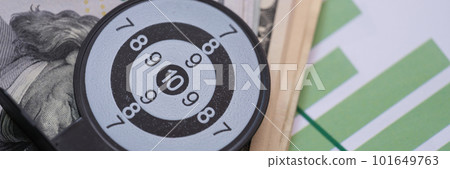 Statistics documents cash and target on table Statistics documents cash and target on table 101649763