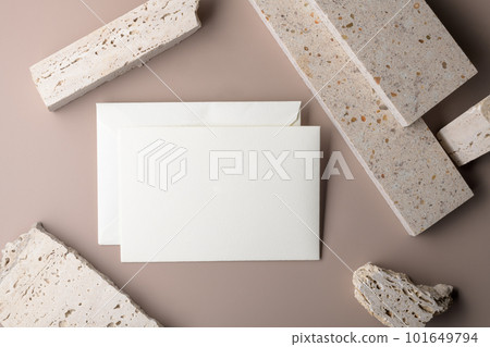 Wedding stationery invitation card mockup on beige background with envelop  101649794
