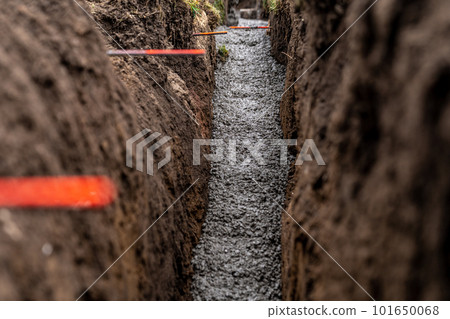 cementing the foundation in the ground when building a house 101650068