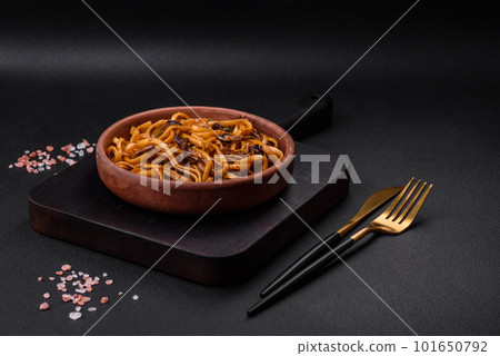 Delicious noodles or udon with mushrooms, salt, spices and herbs Delicious noodles or udon with mushrooms, salt, spices and herbs 101650792