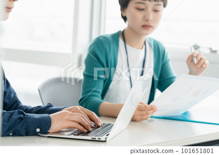 Hands of young men and women having a meeting in the office Hands of young men and women having a meeting in the office 101651801