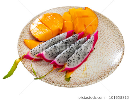 Breakfast with sweet pitaya and mango. Plate with pitaya and mango 101658813