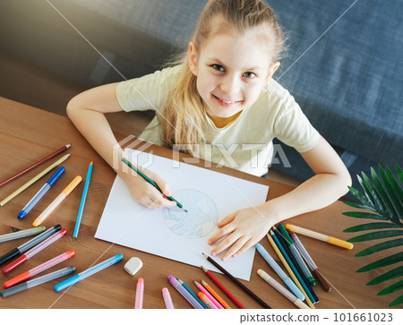 Child girl drawing with colorful pencils Child girl drawing with colorful pencils 101661023