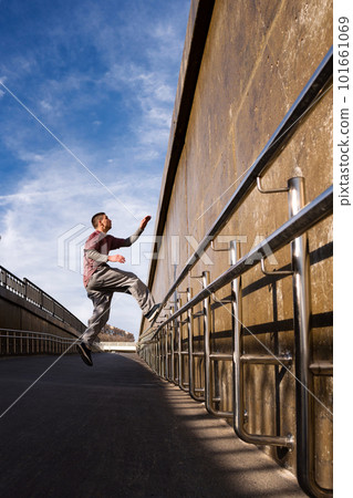Man doing parkour. Free runner 101661069