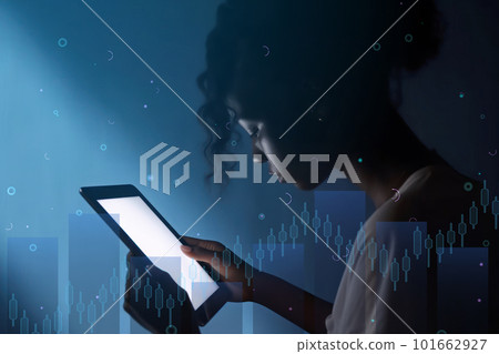 A woman who operates a tablet A woman who operates a tablet 101662927