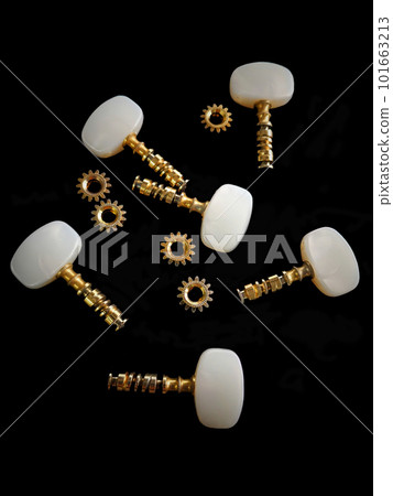 close up shot of the separate parts of classical guitar tuning machine close up shot of the separate parts of classical guitar tuning machine 101663213