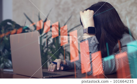 Business woman upset because of falling quotes, concept of risk trading 101664235