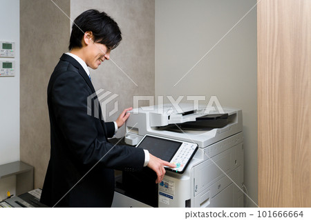 Businessman taking a copy 101666664
