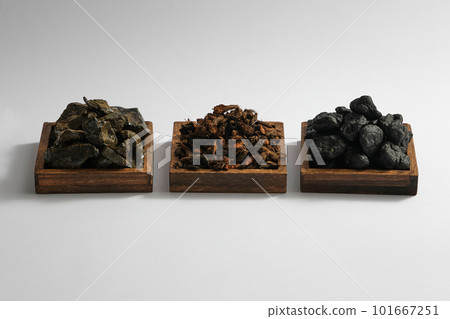 Dried aloe vera, Purple Nutsedge and Radix rehmanniae placed on few wooden trays in square shape. Healthy medicine concept Dried aloe vera, Purple Nutsedge and Radix rehmanniae placed on few wooden trays in square shape. Healthy medicine concept 101667251
