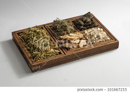 Some types of herb are placed on a wooden tray with five compartments. Herbs are a natural approach to prevention, healing and health support Some types of herb are placed on a wooden tray with five compartments. Herbs are a natural approach to prevention, healing and health support 101667255