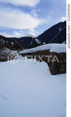 An old stone prison or hut in the mountains. An old stone prison or hut in the mountains. 101669084