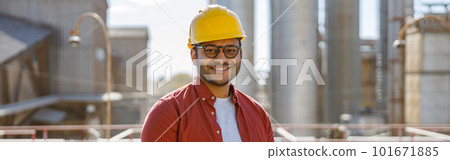 Young construction specialist working at industrial plant 101671885