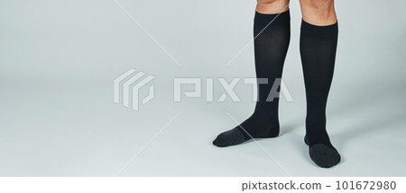 man wears compression socks, banner format man wears compression socks, banner format 101672980