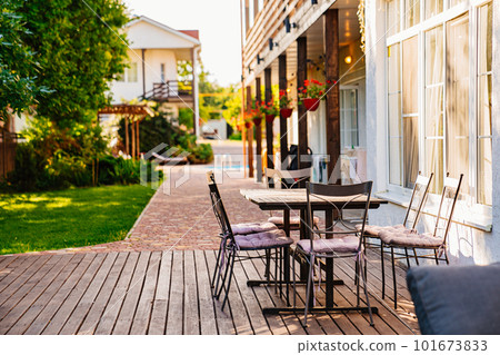 Dining tables at the houses in the hotel. Dining tables at the houses in the hotel. 101673833