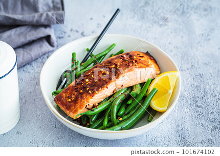 Spicy teriyaki salmon with green beans. Spicy teriyaki salmon with green beans. 101674102
