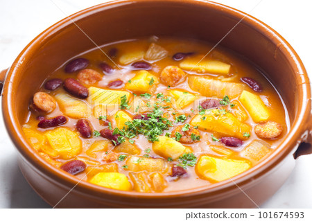 goulash soup with sausage, potatoes and red beans 101674593