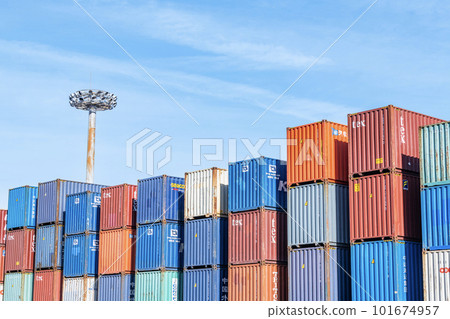 Different colored shipping containers stacked 101674957