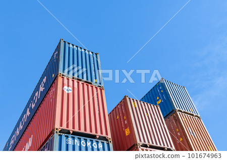 Different colored shipping containers stacked 101674963