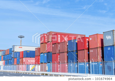 Different colored shipping containers stacked 101674964