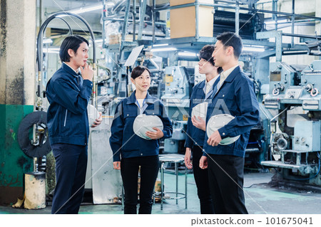 group photo of factory workers group photo of factory workers 101675041