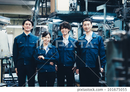 group photo of factory workers group photo of factory workers 101675055