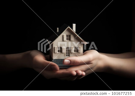 hands hold the house. mortgage and property insurance 101677255