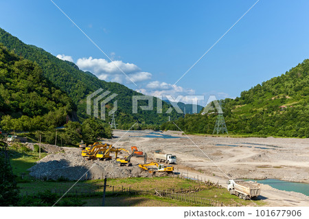Clearing the riverbed in the mountains Clearing the riverbed in the mountains 101677906
