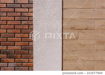 Different textures of the exterior decoration of the walls of the house Different textures of the exterior decoration of the walls of the house 101677984