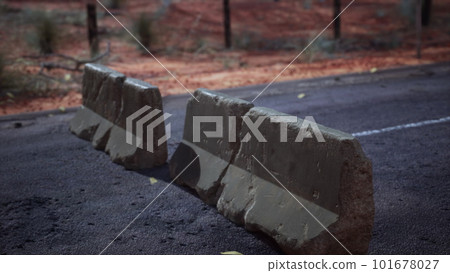 old rusted concrete road barrier blocks 101678027