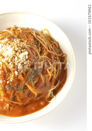 A bird's-eye view of a large serving of meat sauce pasta on a white background A bird's-eye view of a large serving of meat sauce pasta on a white background 101678661