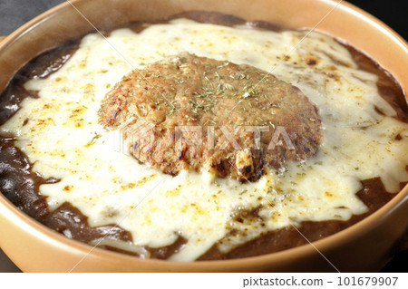 Hot grilled curry with plenty of cheese and hamburger on a black background 101679907