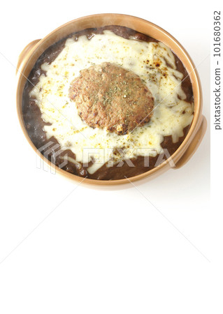 A bird's-eye view of a hot curry with plenty of cheese and hamburger on a white background A bird's-eye view of a hot curry with plenty of cheese and hamburger on a white background 101680362