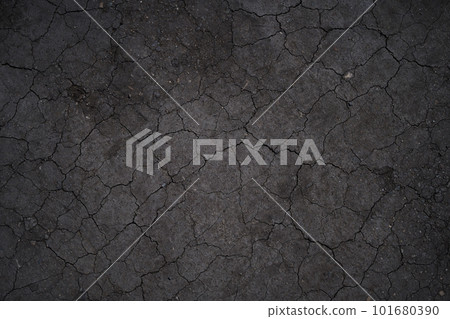 Dry cracked earth, cracks, earth in the sun, black earth, natural background with copy space. High quality photo Dry cracked earth, cracks, earth in the sun, black earth, natural background with copy space. High quality photo 101680390