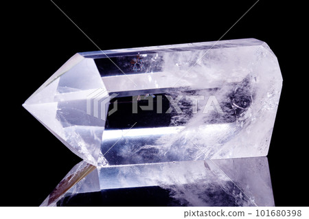 Macro mineral stone Crystal rock crystal on a black background 101680398
