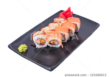 Japanese seafood Sushi roll isolated on white close up. Japanese food restaurant, sushi maki gunkan roll plate or platter set. Maki Sushi rolls with salmon and avocado. Sushi isolated at white 101680813