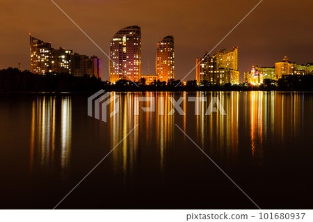 night city with reflection of houses in the river night city with reflection of houses in the river 101680937