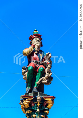 Child Eater Fountain (Kindlifresserbrunnen) is a painted stone fountain in old city of Bern, Switzerland. Built in 1545-1546 Child Eater Fountain (Kindlifresserbrunnen) is a painted stone fountain in old city of Bern, Switzerland. Built in 1545-1546 101682200