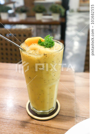 mango smoothie or mango yogurt smoothie, mango and passion fruit smoothie with mango topping mango smoothie or mango yogurt smoothie, mango and passion fruit smoothie with mango topping 101682555