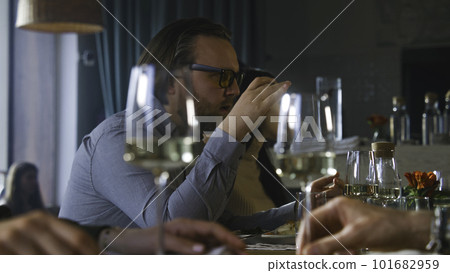 Man talks to friends on meeting in cafe Man talks to friends on meeting in cafe 101682959