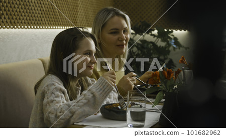 Happy family celebrate birthday together in cafe Happy family celebrate birthday together in cafe 101682962